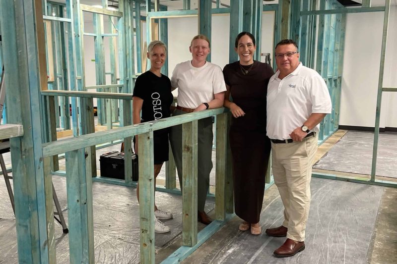 WOTSO - Kogarah site shot. From left, WOTSO space leader Arianna Pozzobon, regional manager Matilda Eder, CEO Jessie Glew, and Kogarah Clubhouse GM Grant Amer on site. Picture by Jim Gainsfor